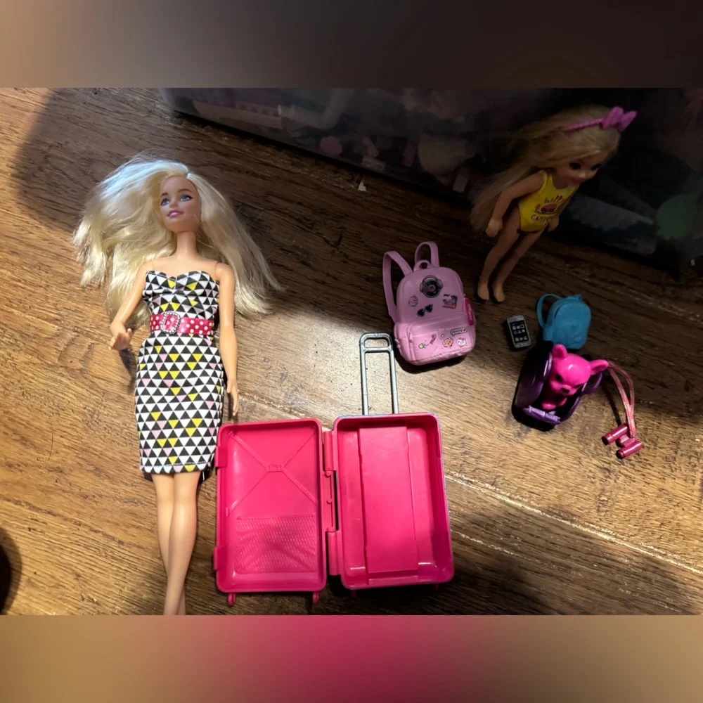 Barbie includes her